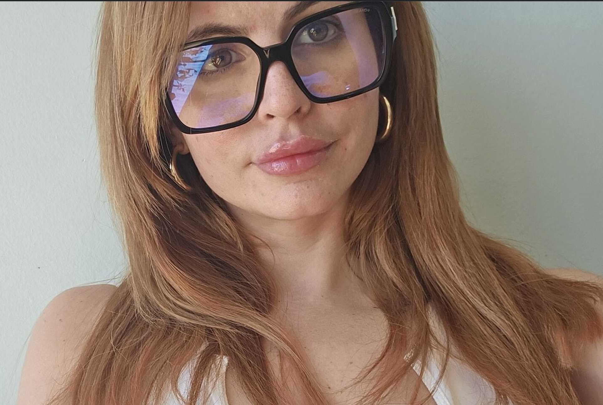 Portrait of Rachel Burns wearing glasses